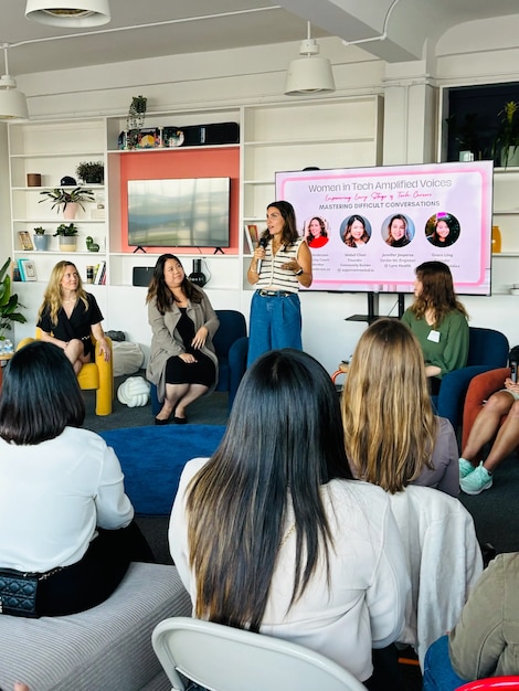 Women in Tech panel discussion about Mastering Difficult Conversations with multiple speakers and audience members